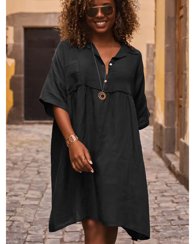 Woman wearing a black linen dress for women by Sogiftme with button-up front and relaxed fit