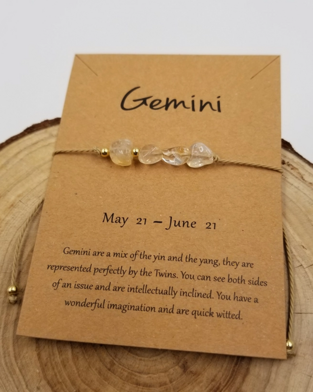 Gemini zodiac constellation bracelet by Chakra Jewelry with delicate beads on a tan card